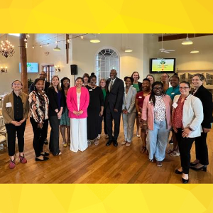 Group photo of Ready Ready and WJWI staff at Revolution Mill iin Greensboro, N.C. on 5-23-23